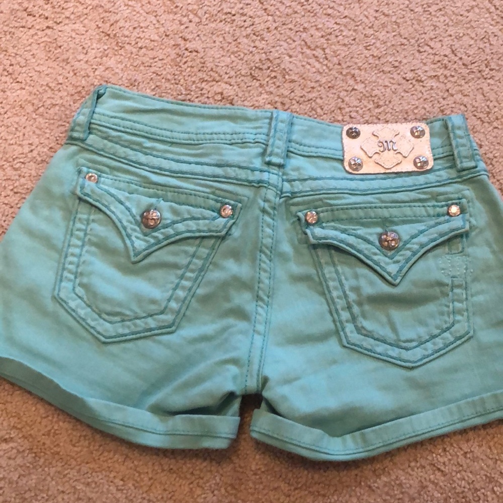 Miss me turquoise shorts.